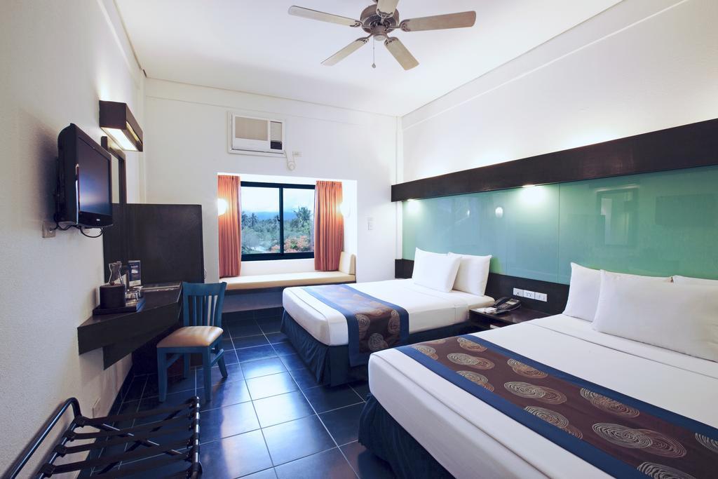 Microtel By Wyndham Puerto Princesa Exterior foto